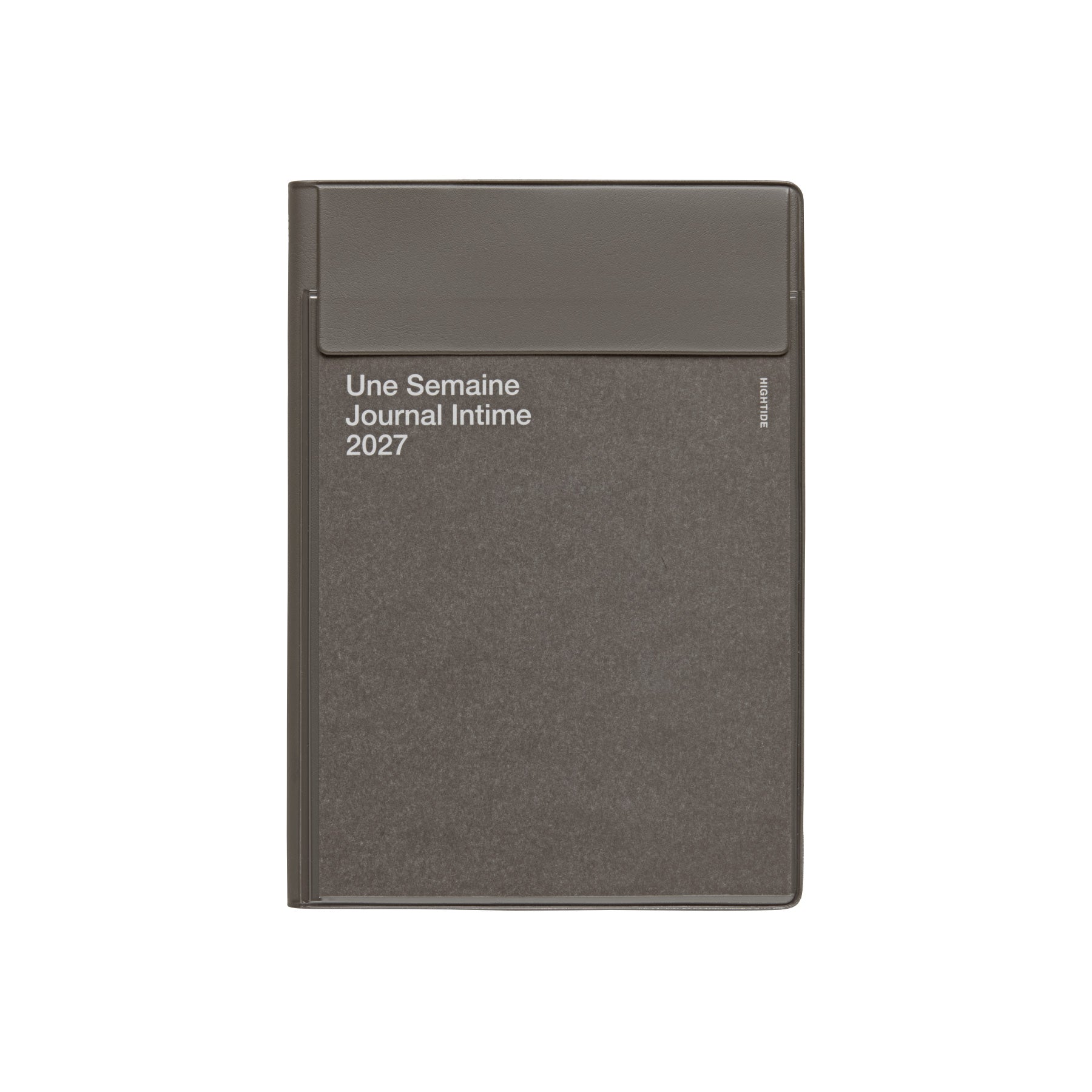 Hightide Charcoal Gray B6 weekly planner cover with lidded pocket and "Une Semaine Journal Intime 2027" text.