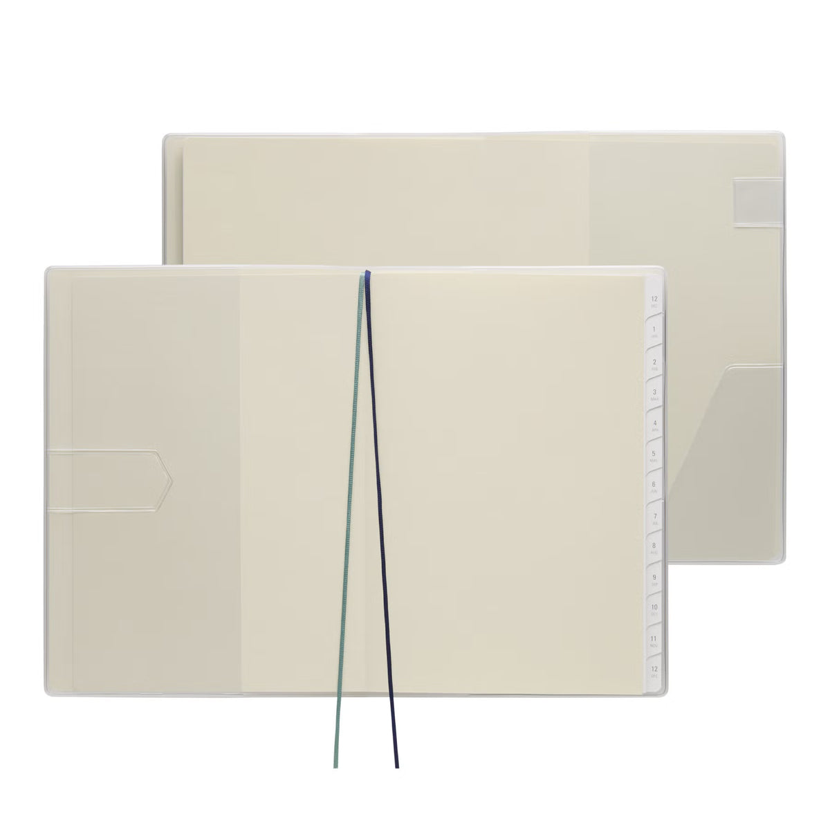 Nähe A5 planner opened flat with clear cover, inner pocket, numbered monthly tabs and two ribbon markers.