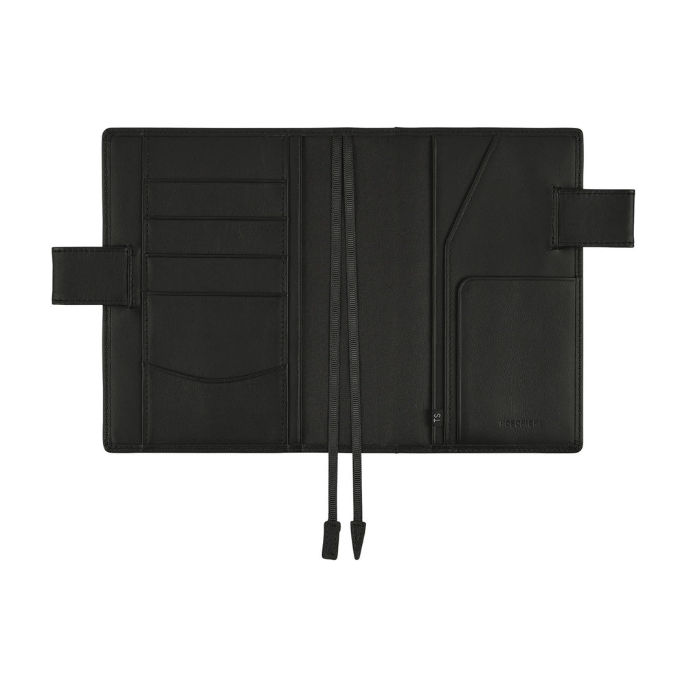 Hobonichi A6 black leather cover opened flat, showing card slots, pockets, side straps and two bookmarks.