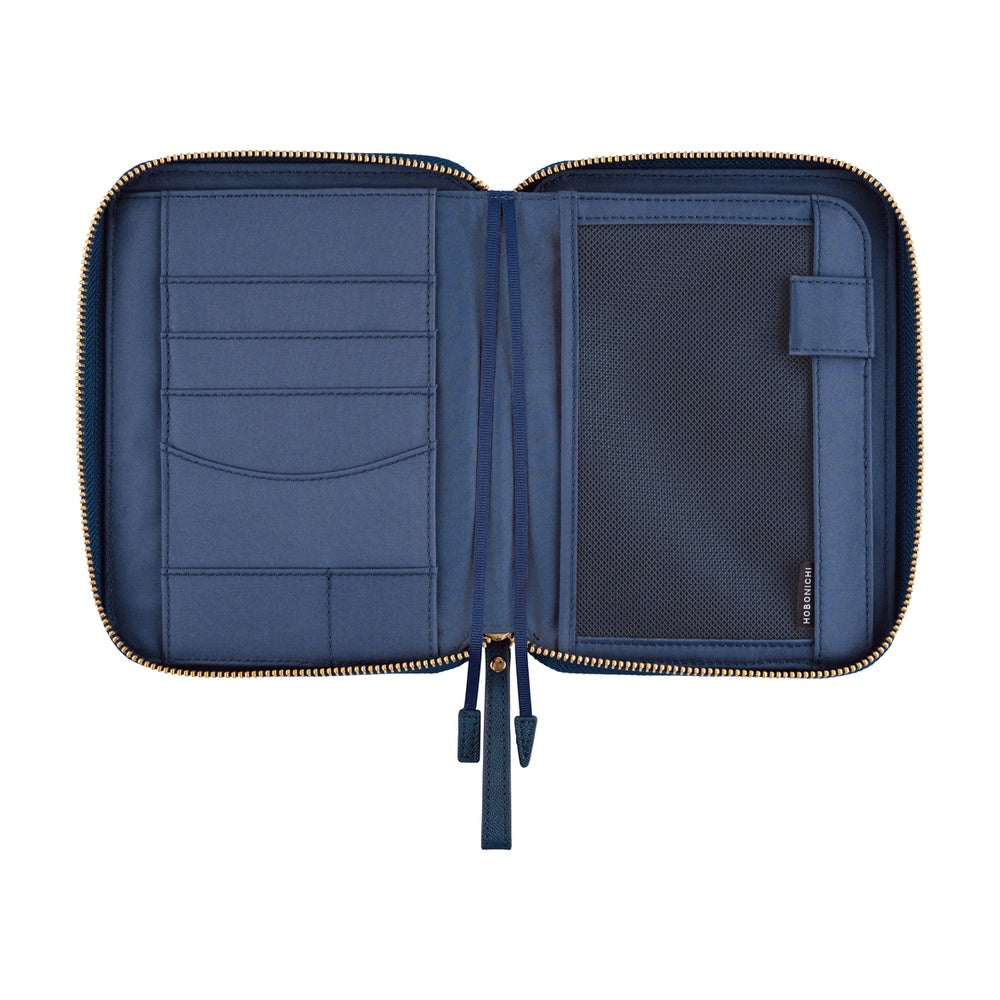 Hobonichi A6 zip planner cover in Lago, open flat to show card slots, pockets and twin zipper pulls