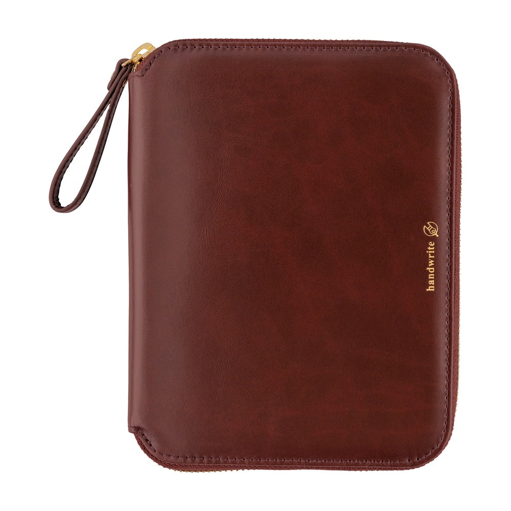 Hobonichi A6 zip planner cover in Amarone with gold zipper, wrist strap and small gold logo