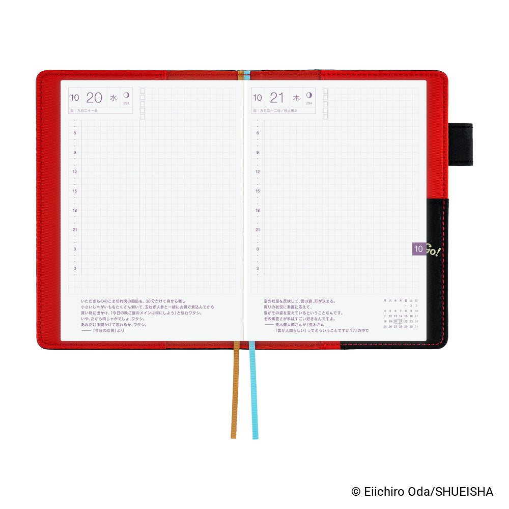 Hobonichi A6 book cover opened flat, showing red interior, daily grid pages and two ribbon bookmarks