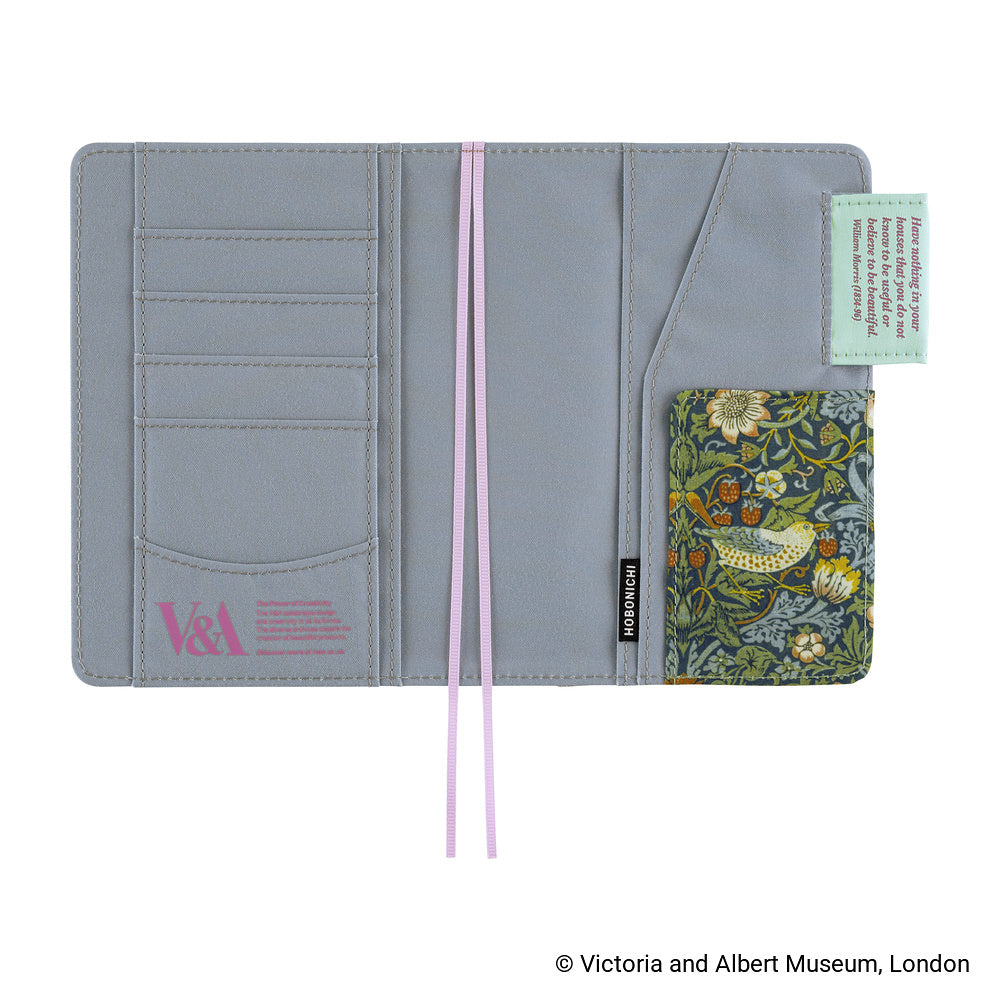 Open Hobonichi A6 book cover showing grey interior with card slots, pink bookmarks and floral pocket