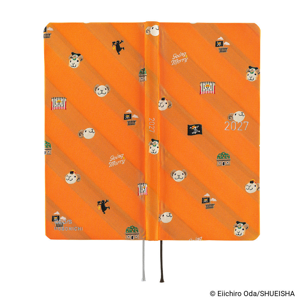 Orange Hobonichi Weeks One Piece cover laid flat, embroidered Going Merry motifs, 2027 text, two bookmarks