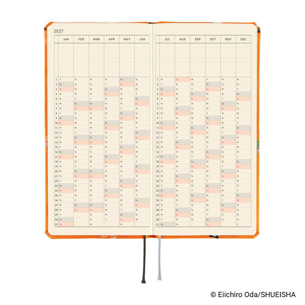 Planner opened flat to a 2027 year-at-a-glance calendar spread with two ribbon bookmarks and Orange cover edges.