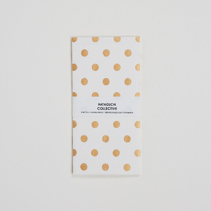 Hataguchi Collective card and envelope set with Gold dot pattern on white paper, wrapped in a printed paper band.