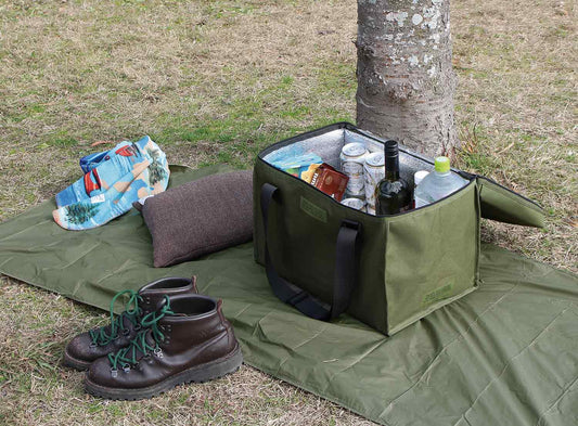 hightide cooler cago thermal bag in large size at an outdoor picnic scene 