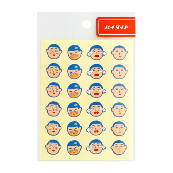 Sticker sheet in packaging with rows of cartoon faces in blue caps showing different expressions.