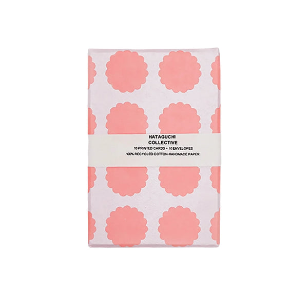 Hataguchi Collective card set wrapped in white paper with Rose scalloped circles and a printed paper band.