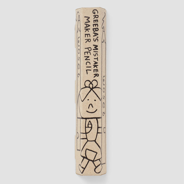 Kraft paper box for Woset Greeba's Mistaker Maker Pencil, printed with a black line drawing of a girl.
