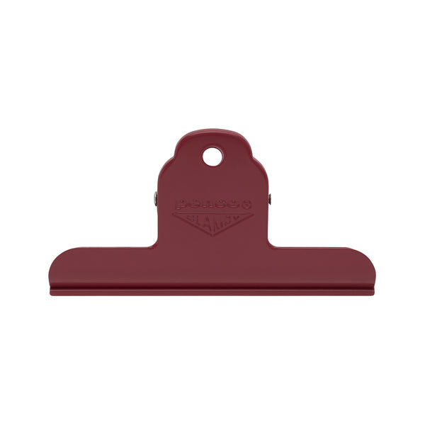 Penco Clampy Clip Metal M in Red, a steel bulldog clip with hanging hole and embossed logo
