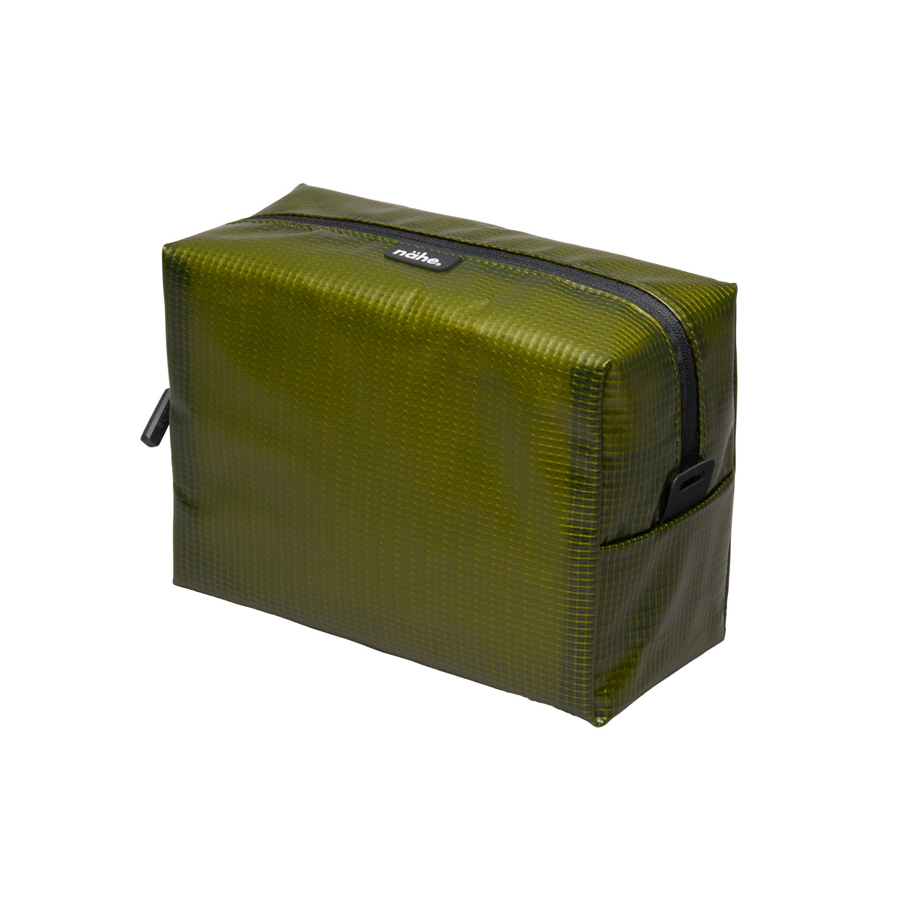 Nähe Soft Grid Pouch in Green, a boxy grid-textured PVC case with black zipper and side pull tab.
