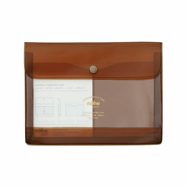 Nähe general purpose case in Clear Brown translucent PVC with a snap-button flap and insert card inside.