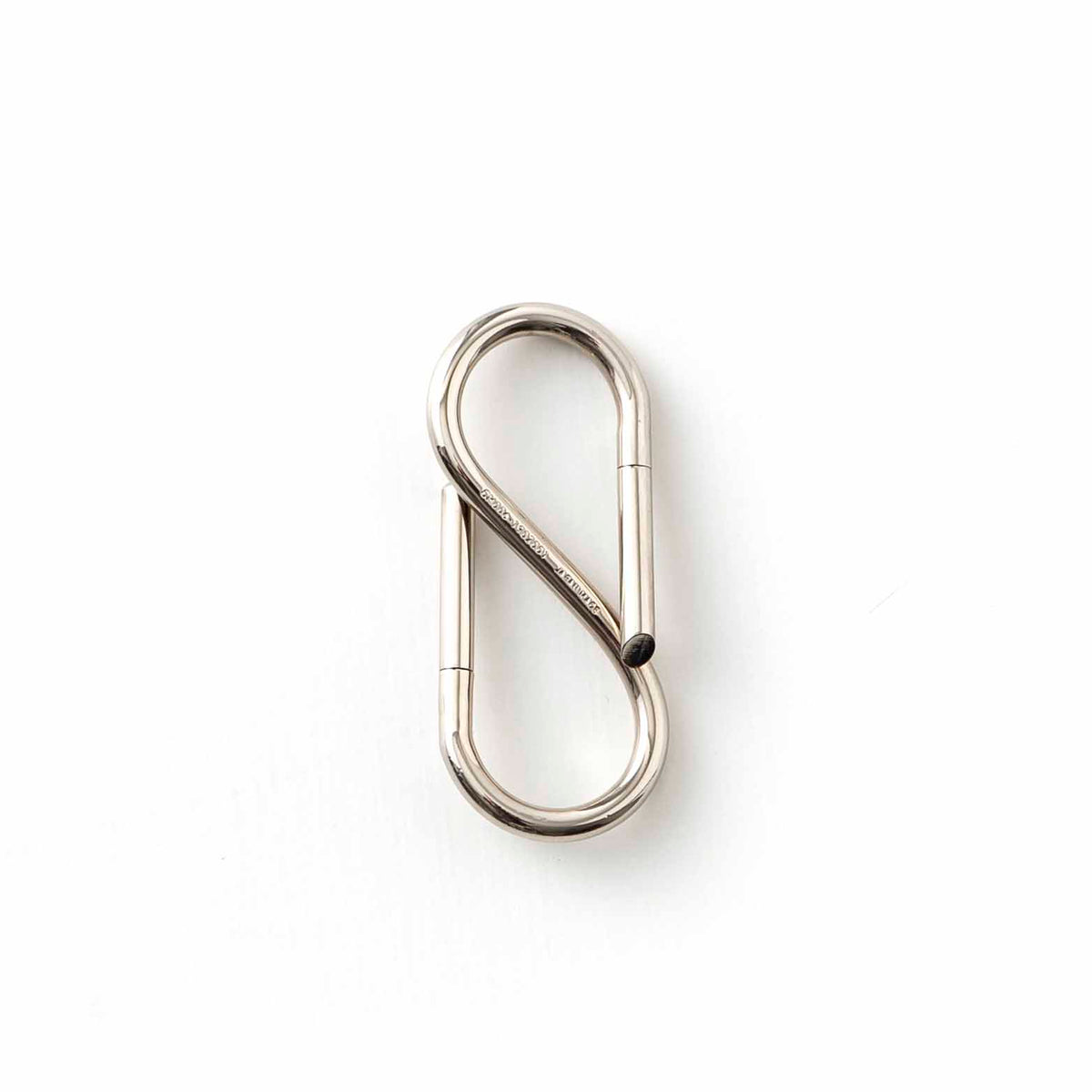 Polished Nickel S-shaped key ring with two oval loops, shown upright on a white background.