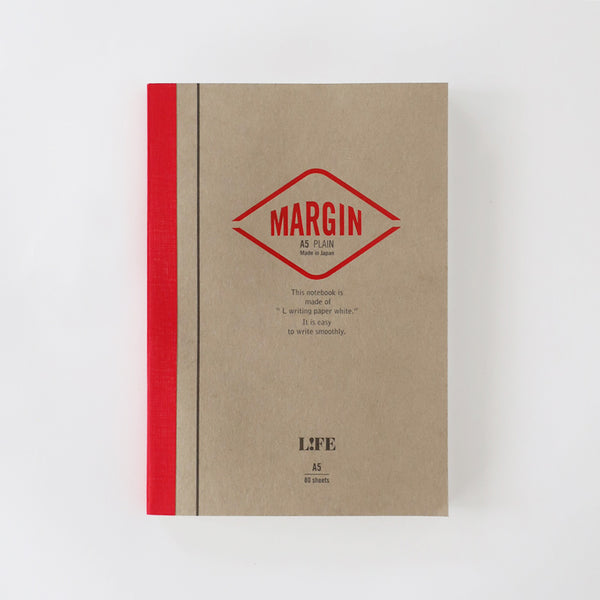 LIFE Margin A5 notebook with kraft card cover, red diamond logo and red cloth-taped spine.