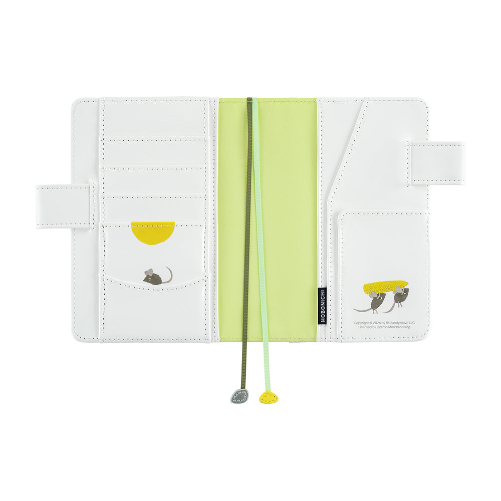 Hobonichi A6 book cover in White, open flat to show card slots, pockets, mouse illustrations and two bookmarks