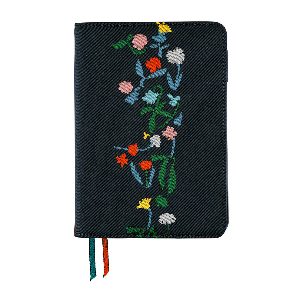 Hobonichi A6 planner cover in Navy with a vertical floral print and teal and orange ribbon bookmarks.