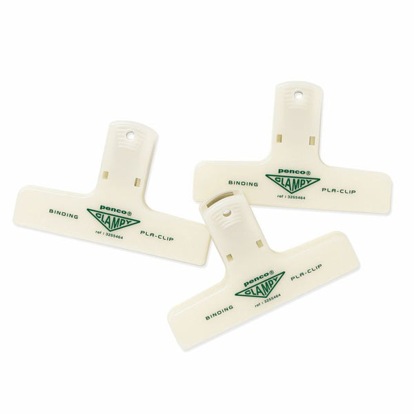 Three Penco Ivory plastic clips with green Clampy logos, arranged on a white background.