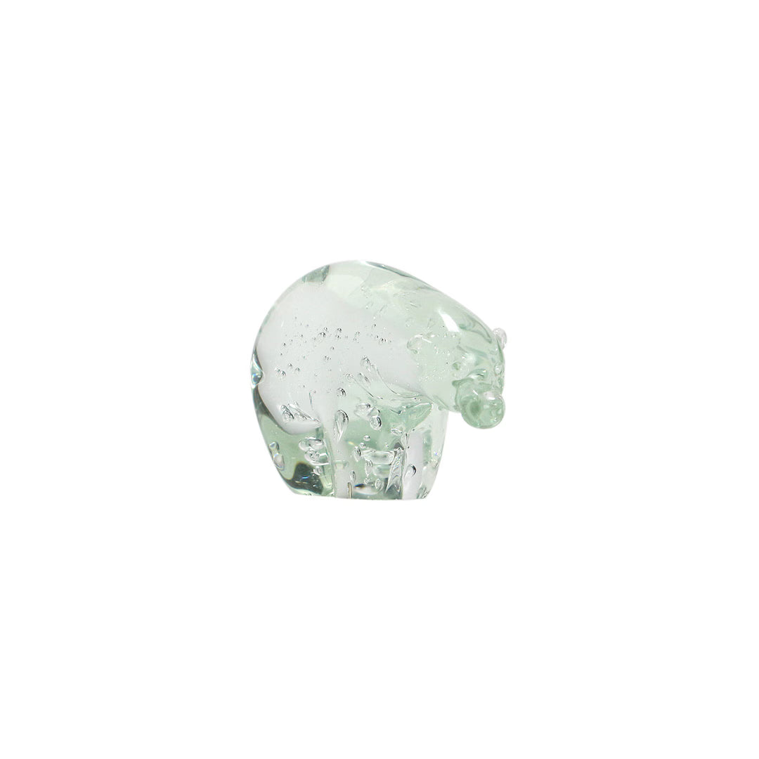 Small clear glass polar bear figurine with air bubbles inside, shown in profile on a white background.