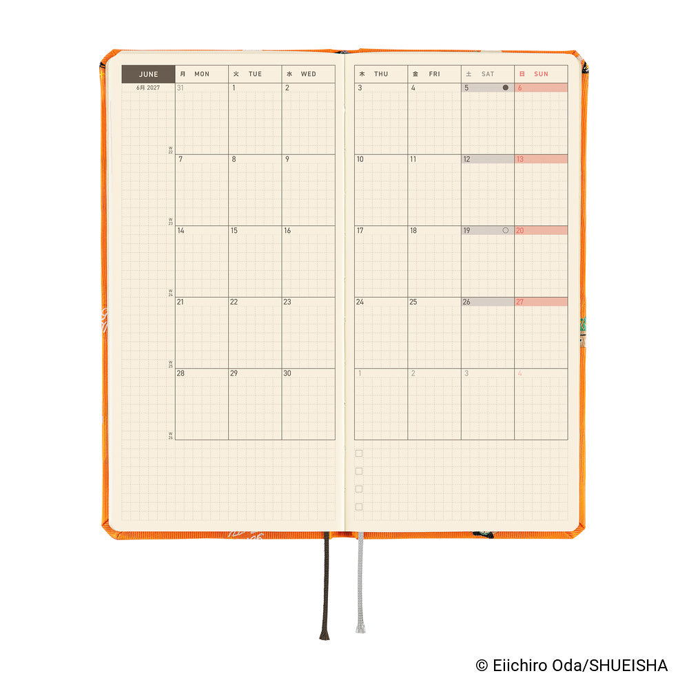 Hobonichi planner open to a June monthly grid calendar page, with Orange cover edges and two ribbon markers.