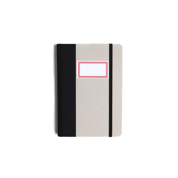 Emilio Braga A6 cardboard notebook with Black spine and elastic band, and a Red-bordered label on the cover.