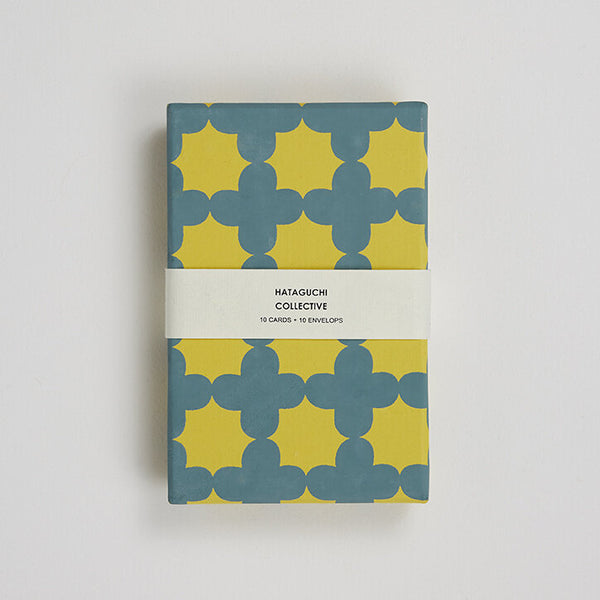 Hataguchi Collective boxed card set with yellow and blue-grey clover pattern and printed paper band.