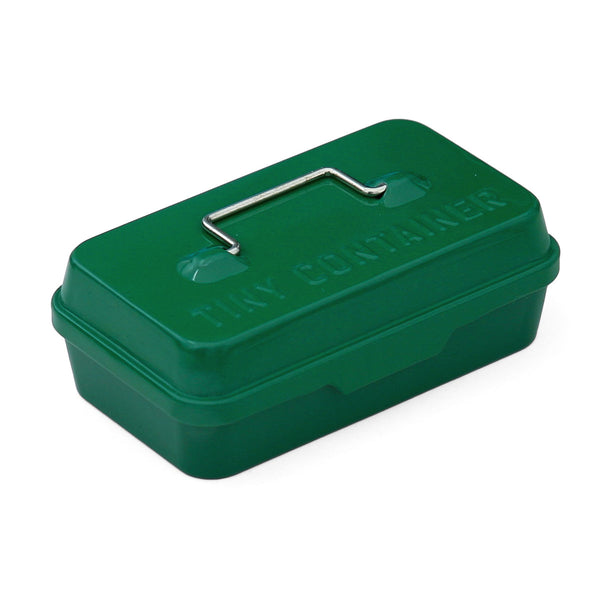 Green tin Tiny Container box with a silver wire handle and embossed "Tiny Container" lettering on the lid.