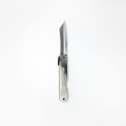 a silver foldable pocket knife with japanese writing embossed logo on handle