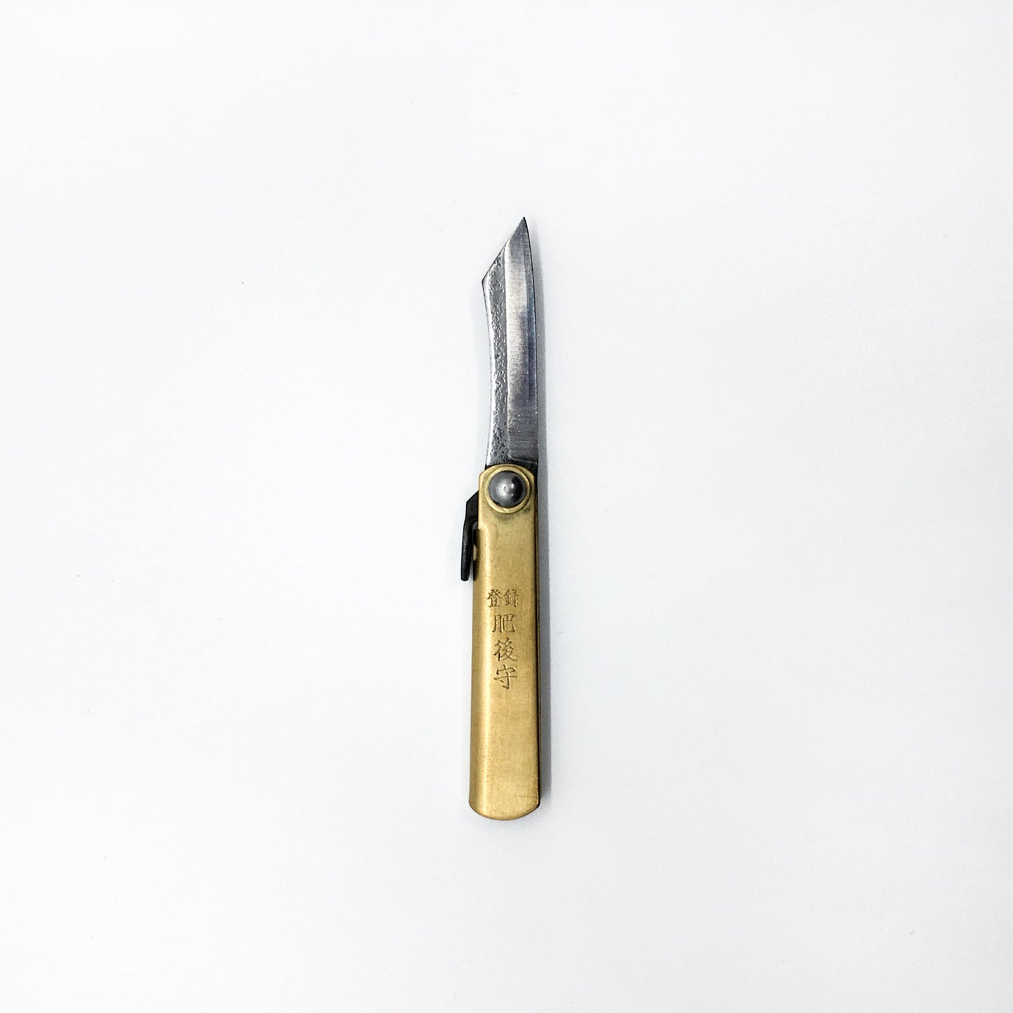 a gold foldable pocket knife with japanese writing embossed logo on handle