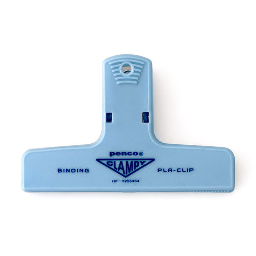 Penco Light Blue plastic binding clip with navy Clampy lettering and a hanging hole at the top.