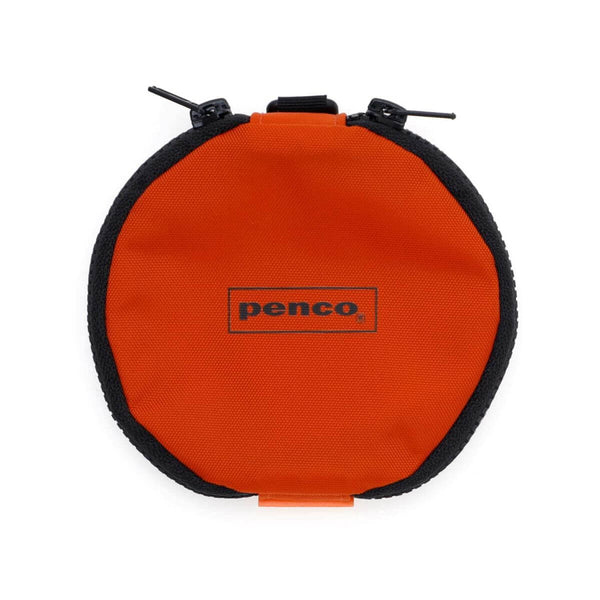 Penco Double Door Purse in Orange, a round nylon pouch with black trim and two zippers.